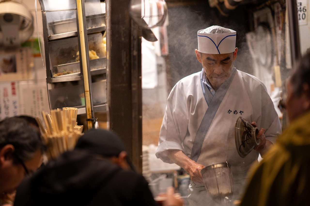 Private chef preparing a meal in a vacation rental kitchen
